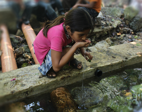Chiapas girl drinking clean water
